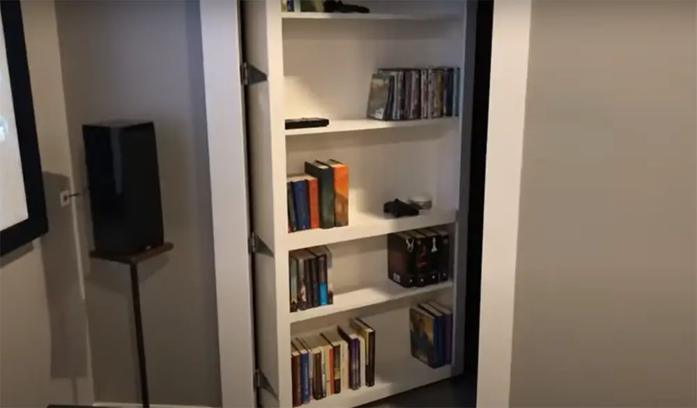 Hide it with a bookshelf