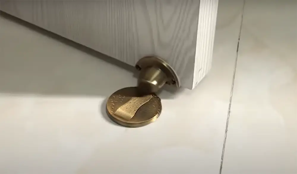 Use a doorstop to prevent anyone from opening the bedroom door from the outside