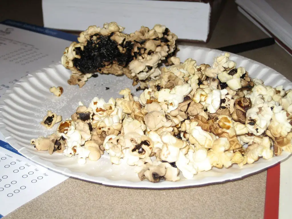 What causes the burnt popcorn to smell