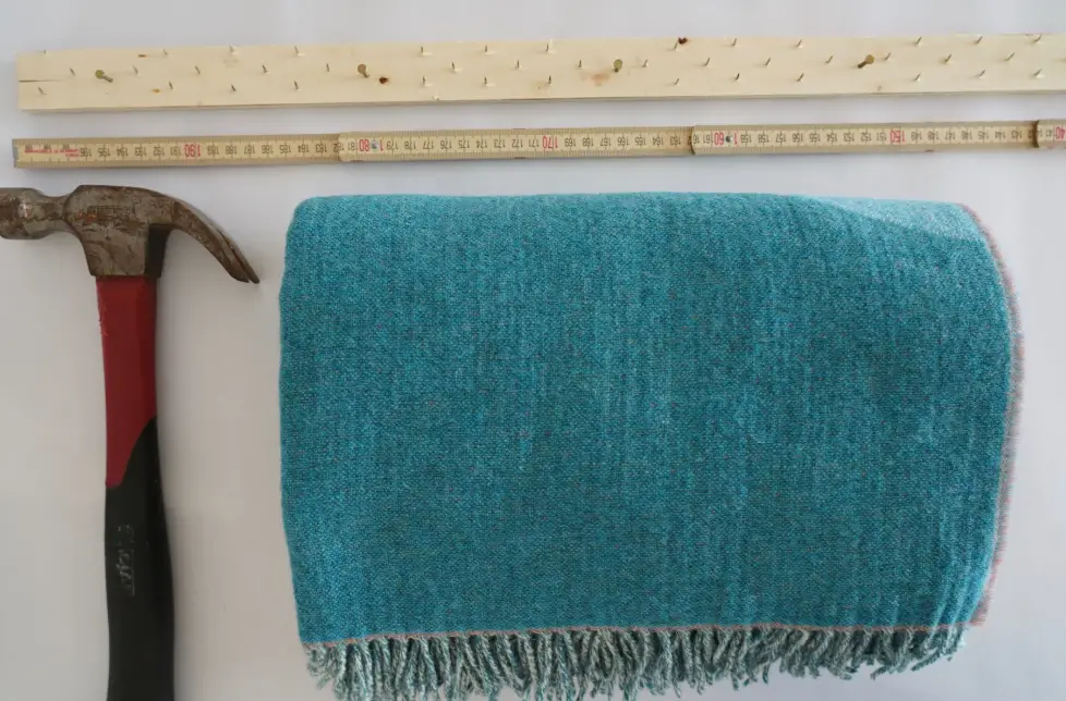 How To Hang A Blanket On A Wall